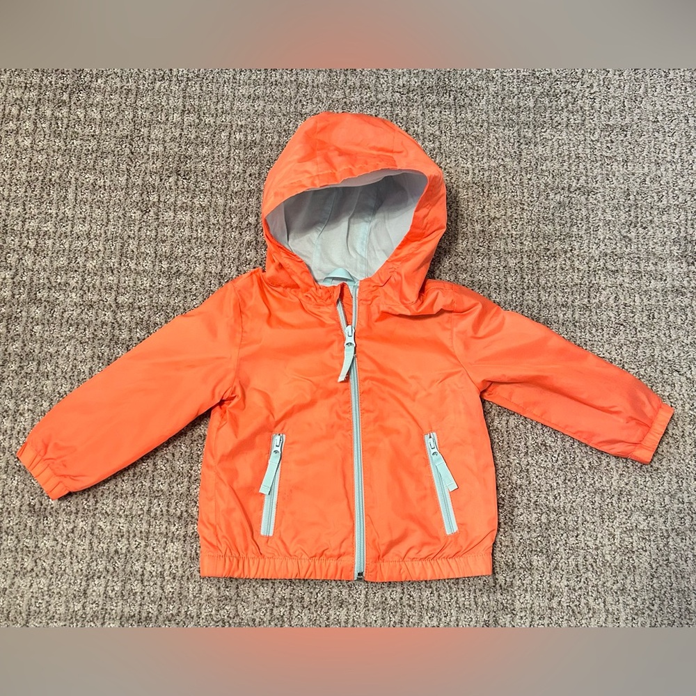 Orange Hooded Windbreaker Jacket with Light Blue Accents
